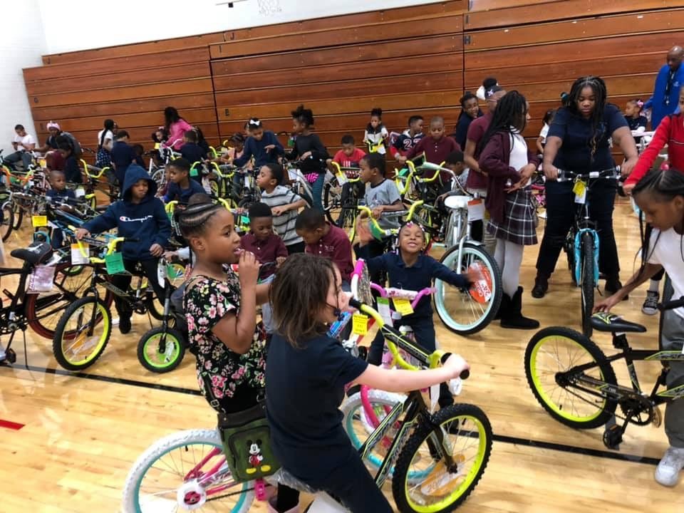 Music Giving Hope bicycle giveaway community moment in Gary, Indiana.